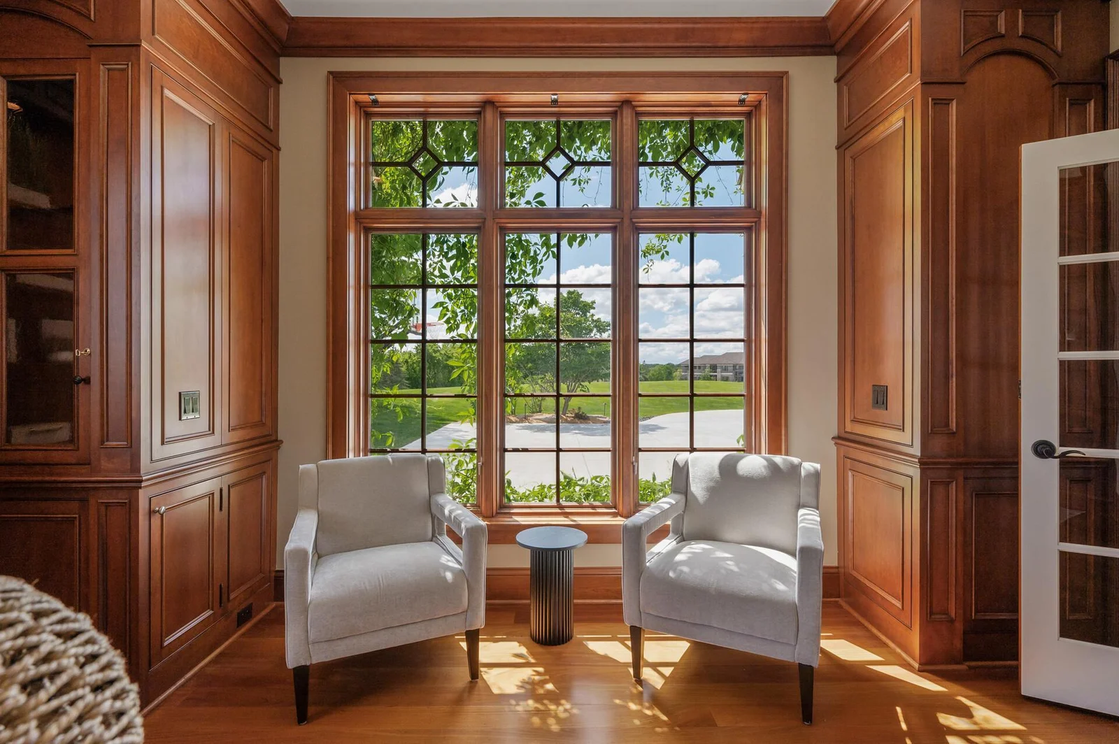 Bathed in natural light, this charming office offers a bright workspace with picturesque views.