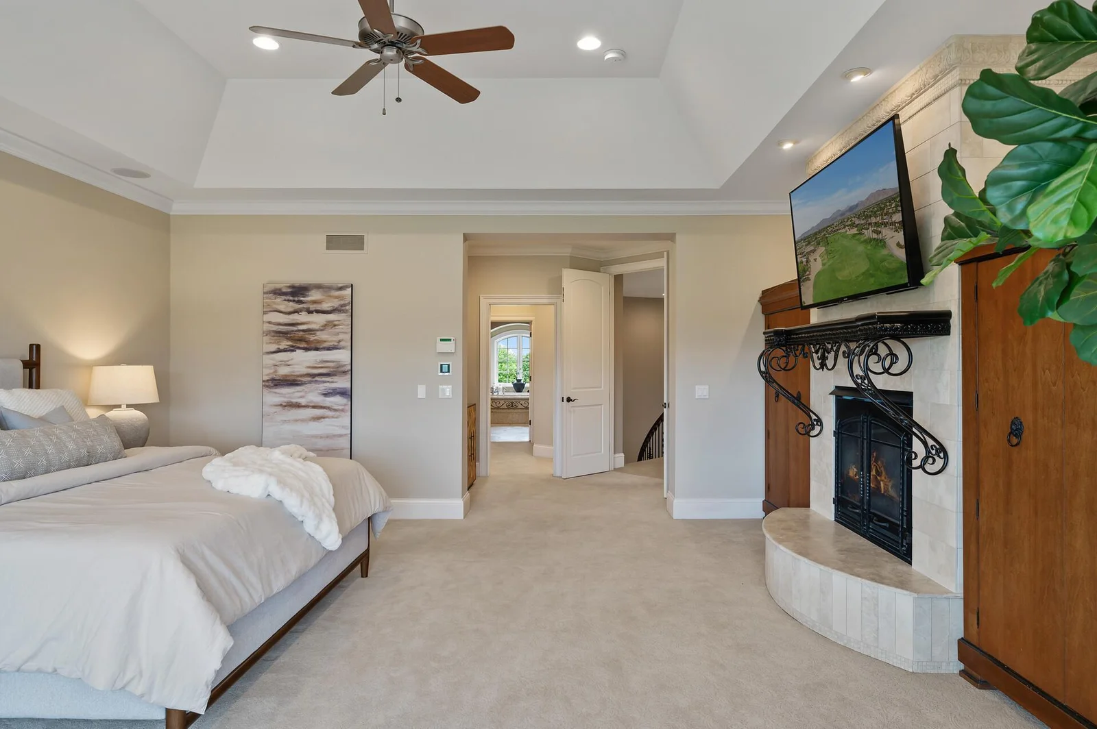 Seamless flow to the ensuite bathroom in this spacious second primary suite.