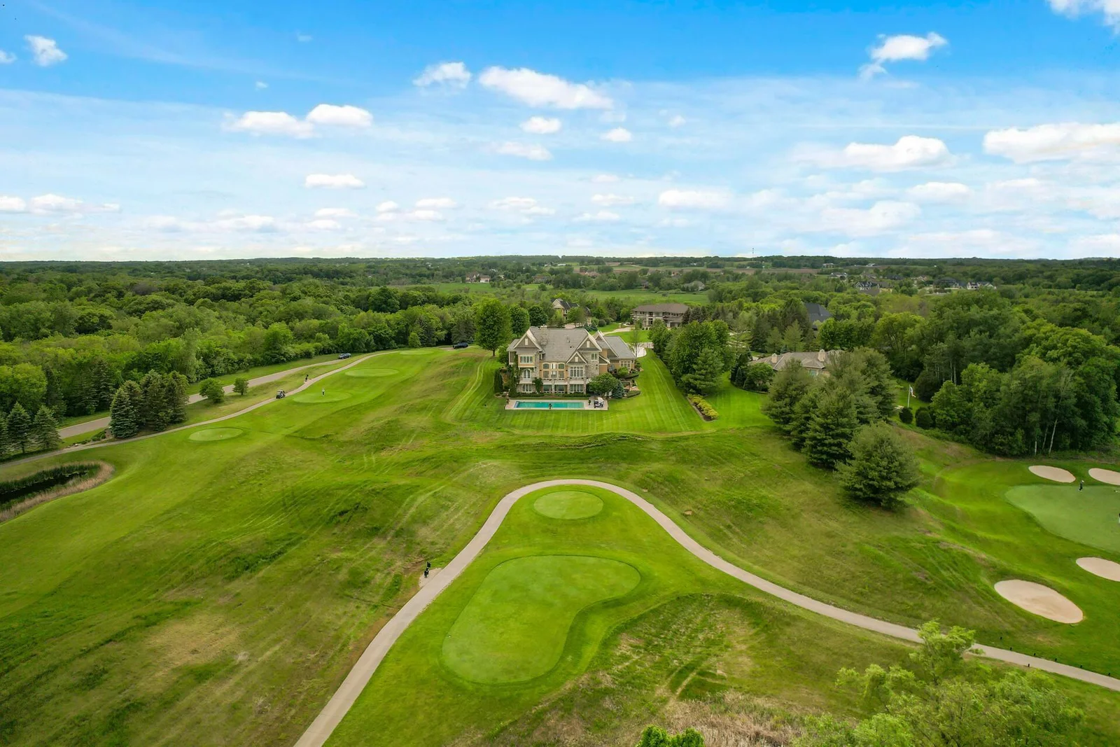 Witness the seamless integration of this luxurious property with the lush greens and fairways of the bordering Legends Gold Course.