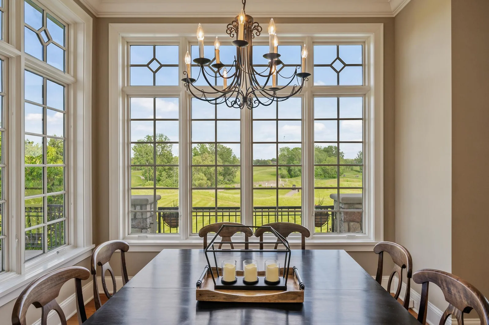 Enjoy your morning coffee with beautiful views in this light-filled informal dining area off the kitchen.