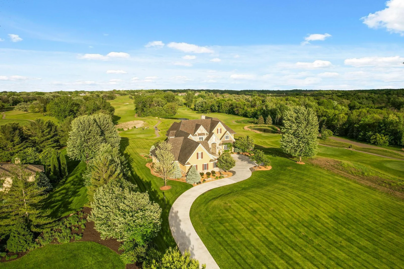 Enjoy a smooth arrival on the new concrete driveway, completed in summer 2024, leading to this stunning home nestled on its expansive grounds.