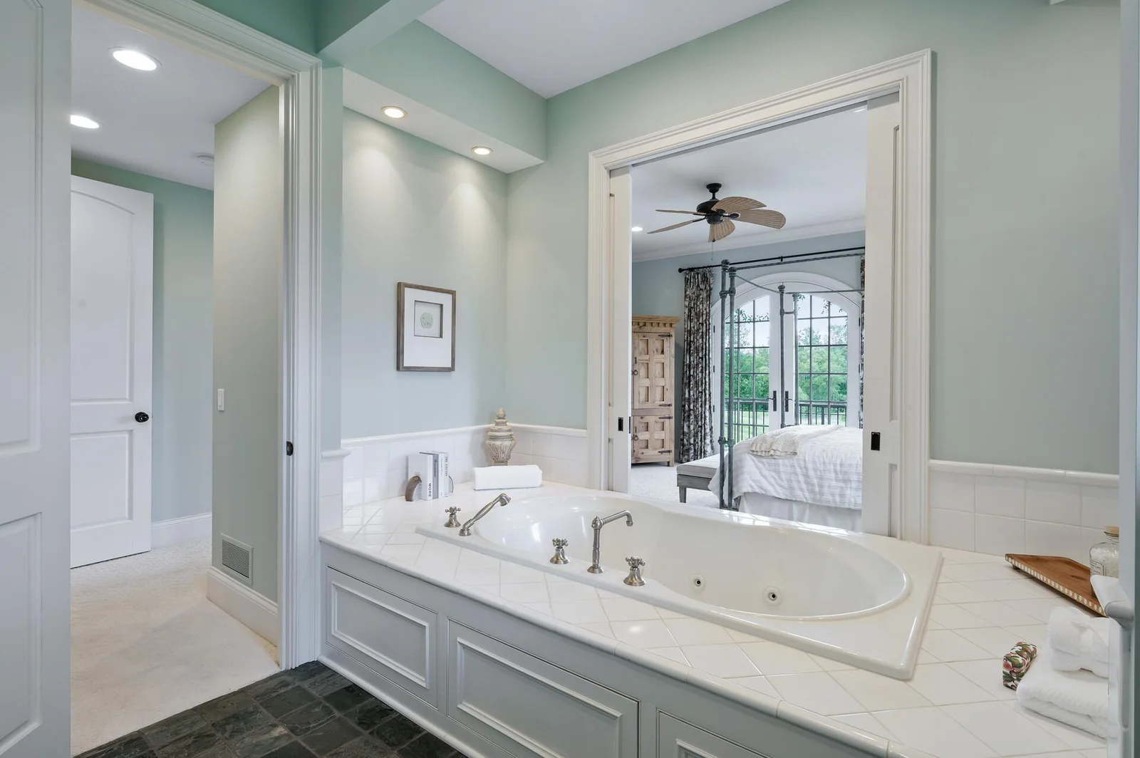 Unwind and rejuvenate in the luxurious whirlpool tub of your primary ensuite. Just steps away from the comfort of your bedroom.