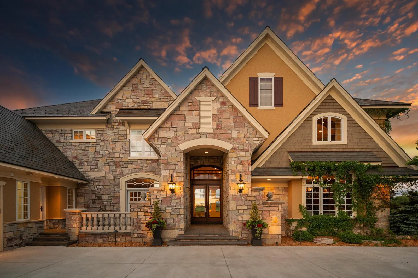 Charming craftsman details like the custom slate roof define the inviting facade of this beautiful home including.