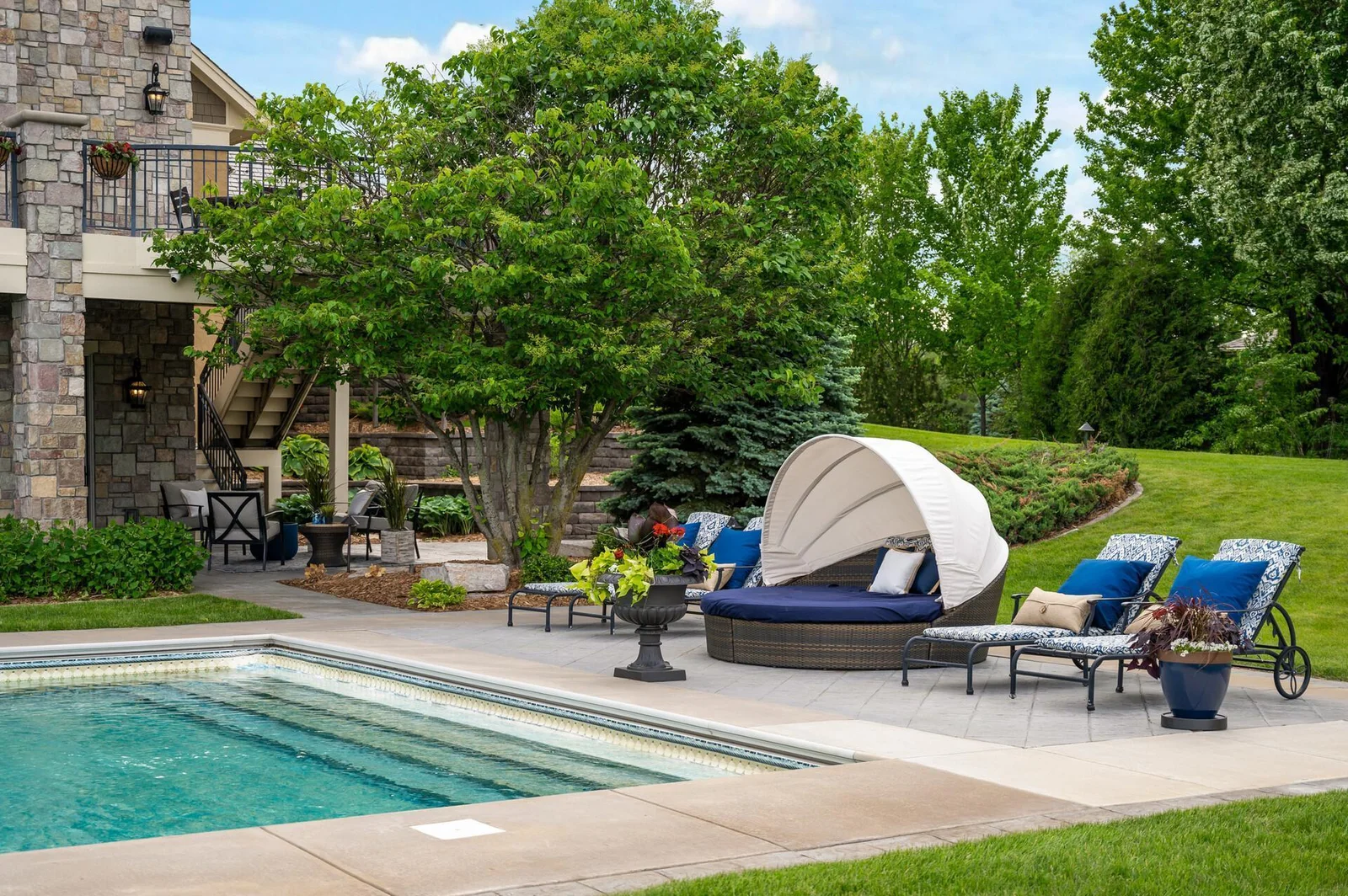 With a variety of comfortable seating options, the pool deck is perfect for both sunbathing and relaxing in the shade.