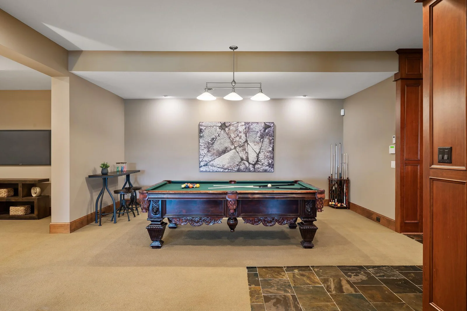 Enjoy the expansive lower level, perfect for games and gatherings.