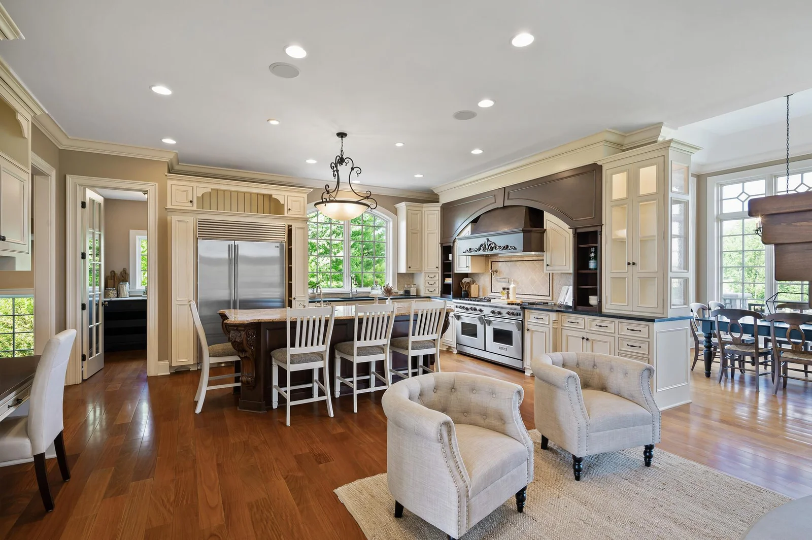 The spacious and open kitchen flows seamlessly into a comfortable sitting area.