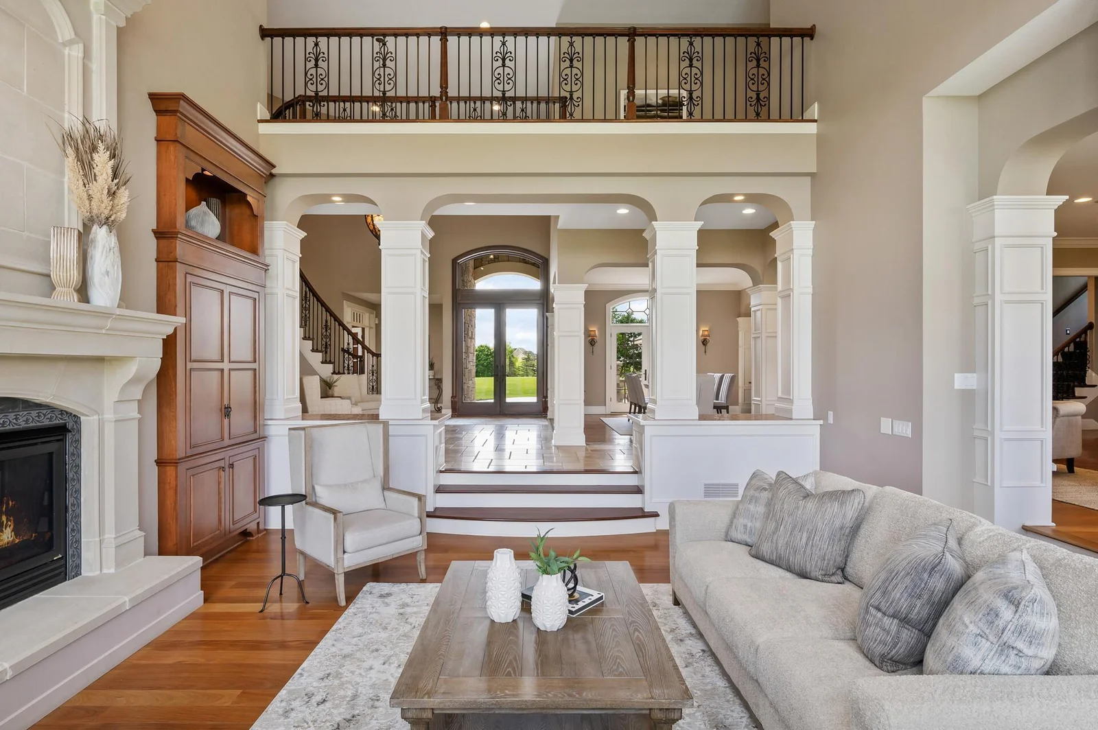 Spacious and inviting living room with fireplace and open design.