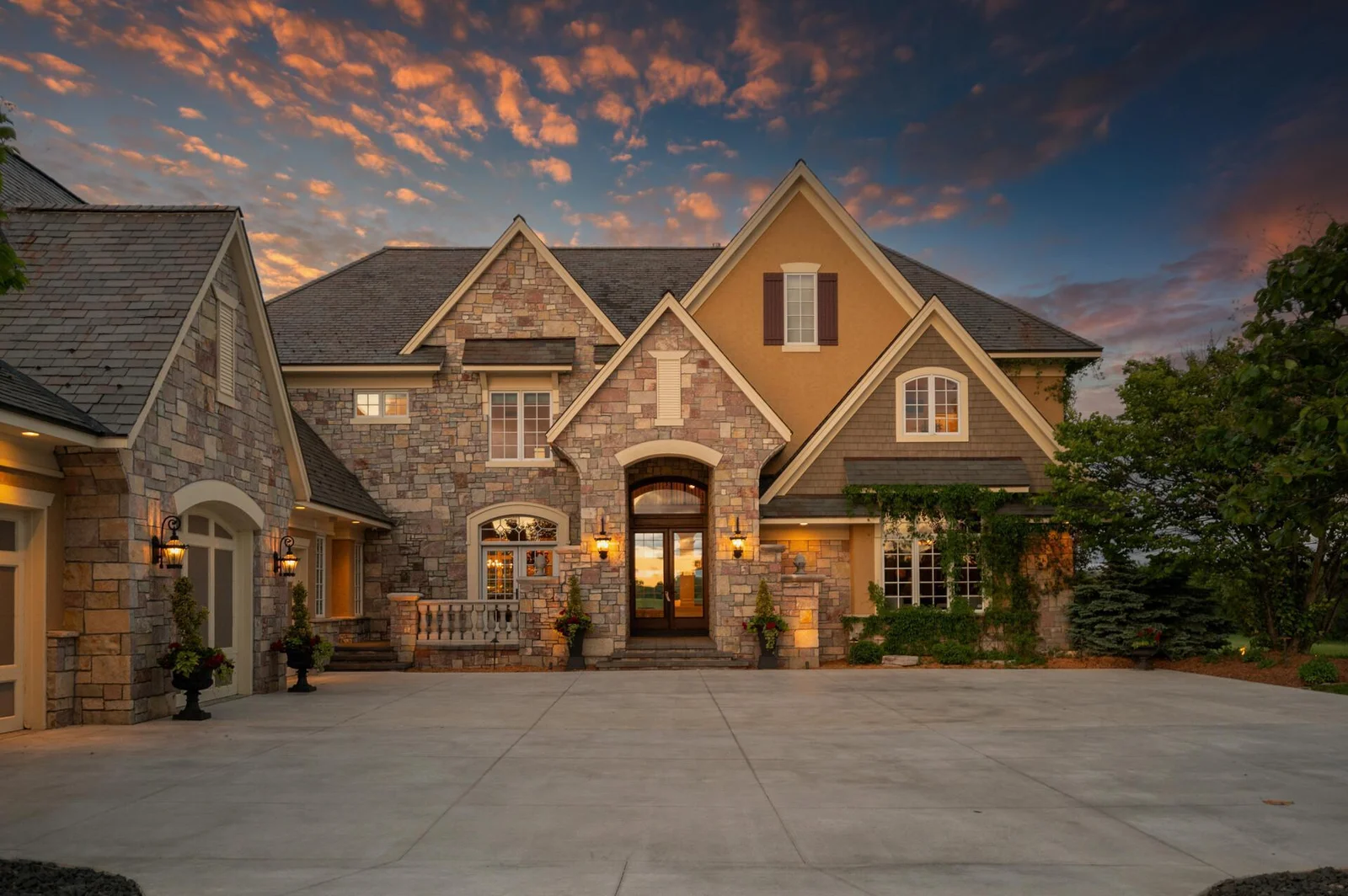 The grand entrance of this estate welcomes you with warmth and elegance.