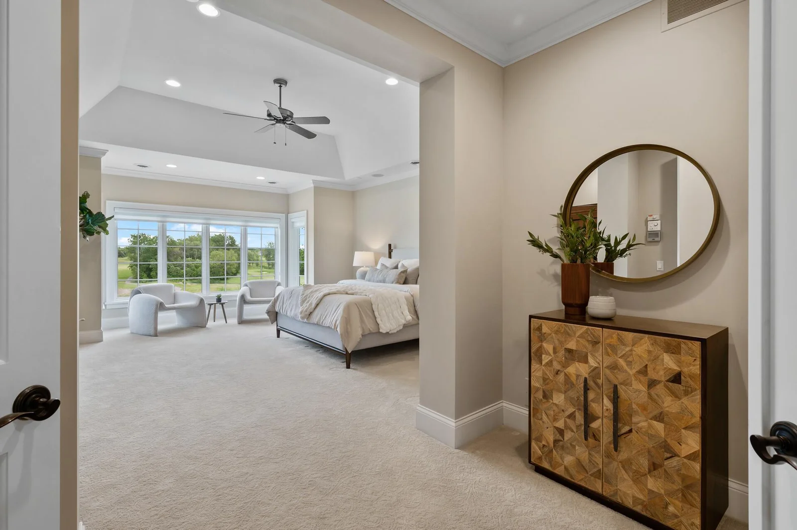 Elegant design and ample space define this stunning second primary suite on the upper level.