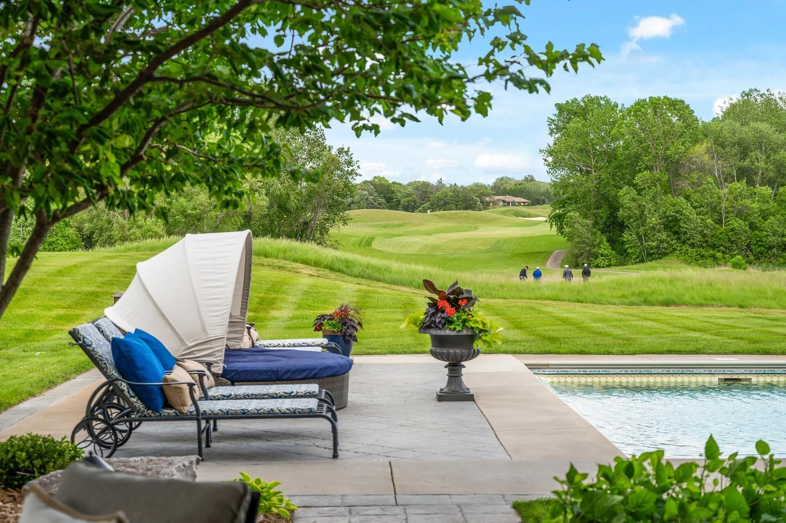 Lounge by the pool with picturesque views.