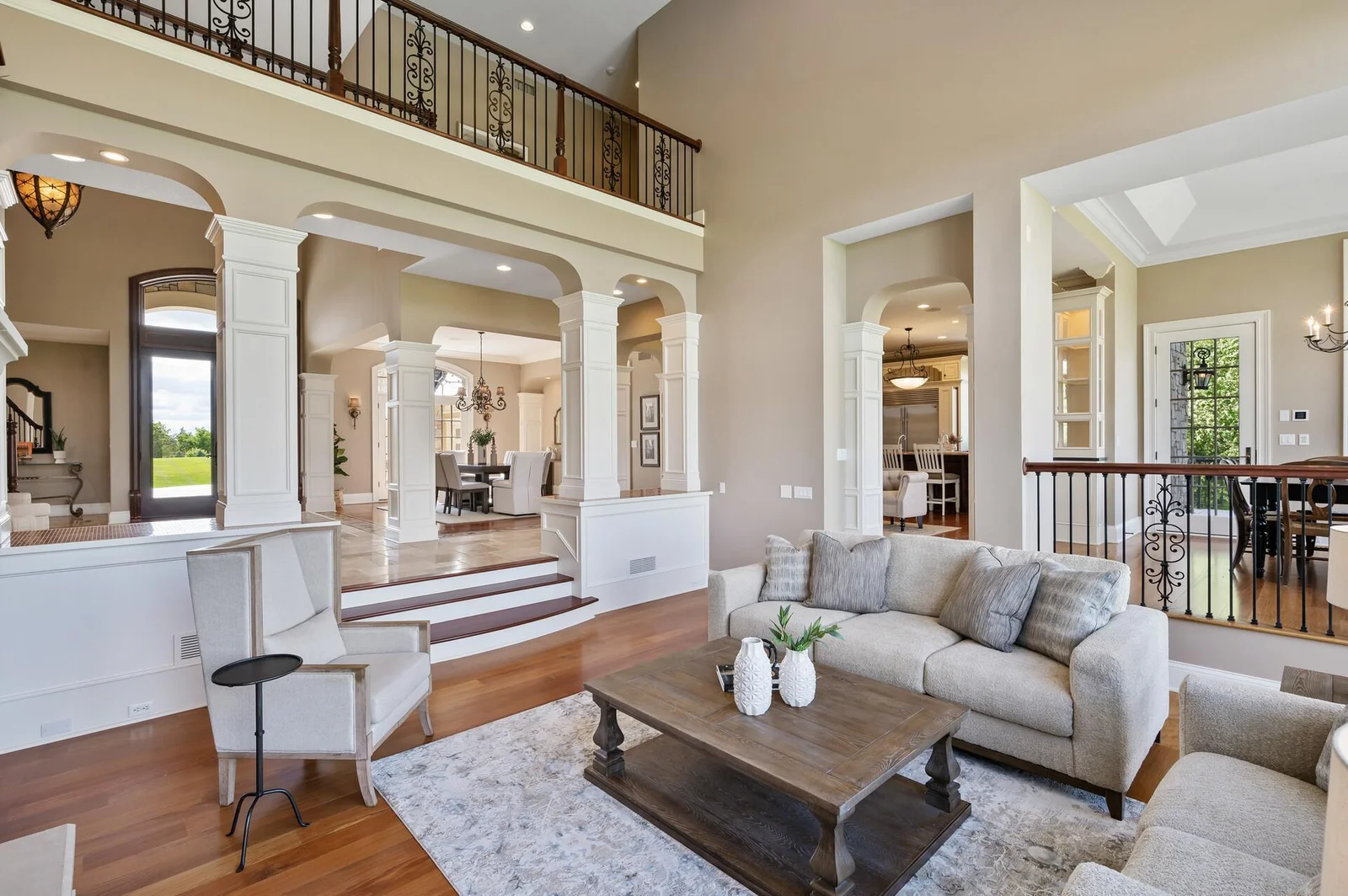 Soaring ceilings and a view to the upper level define the impressive two-story living space.