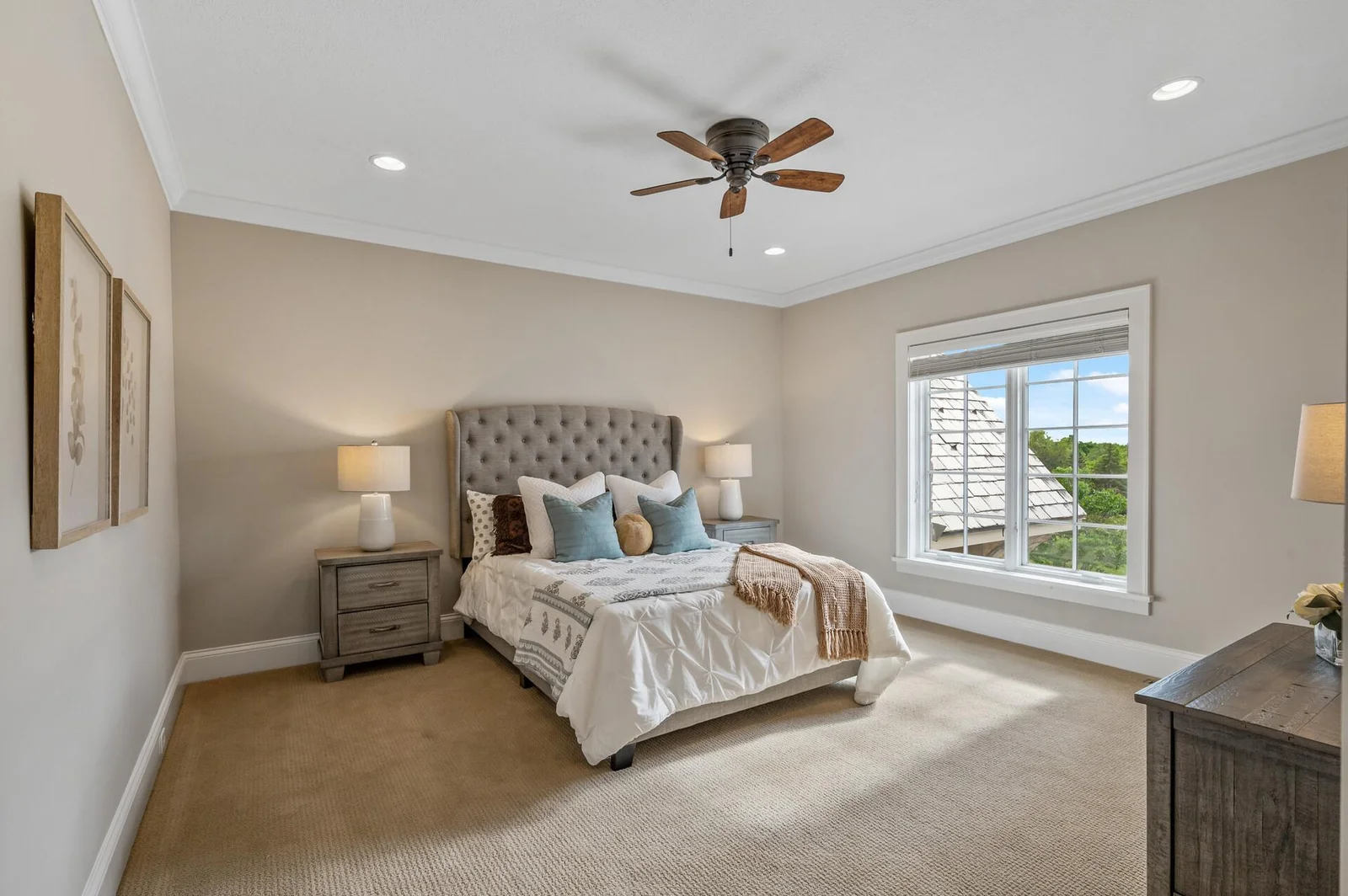 Another comfortable and inviting bedroom on the upper level, perfect for family or guests.