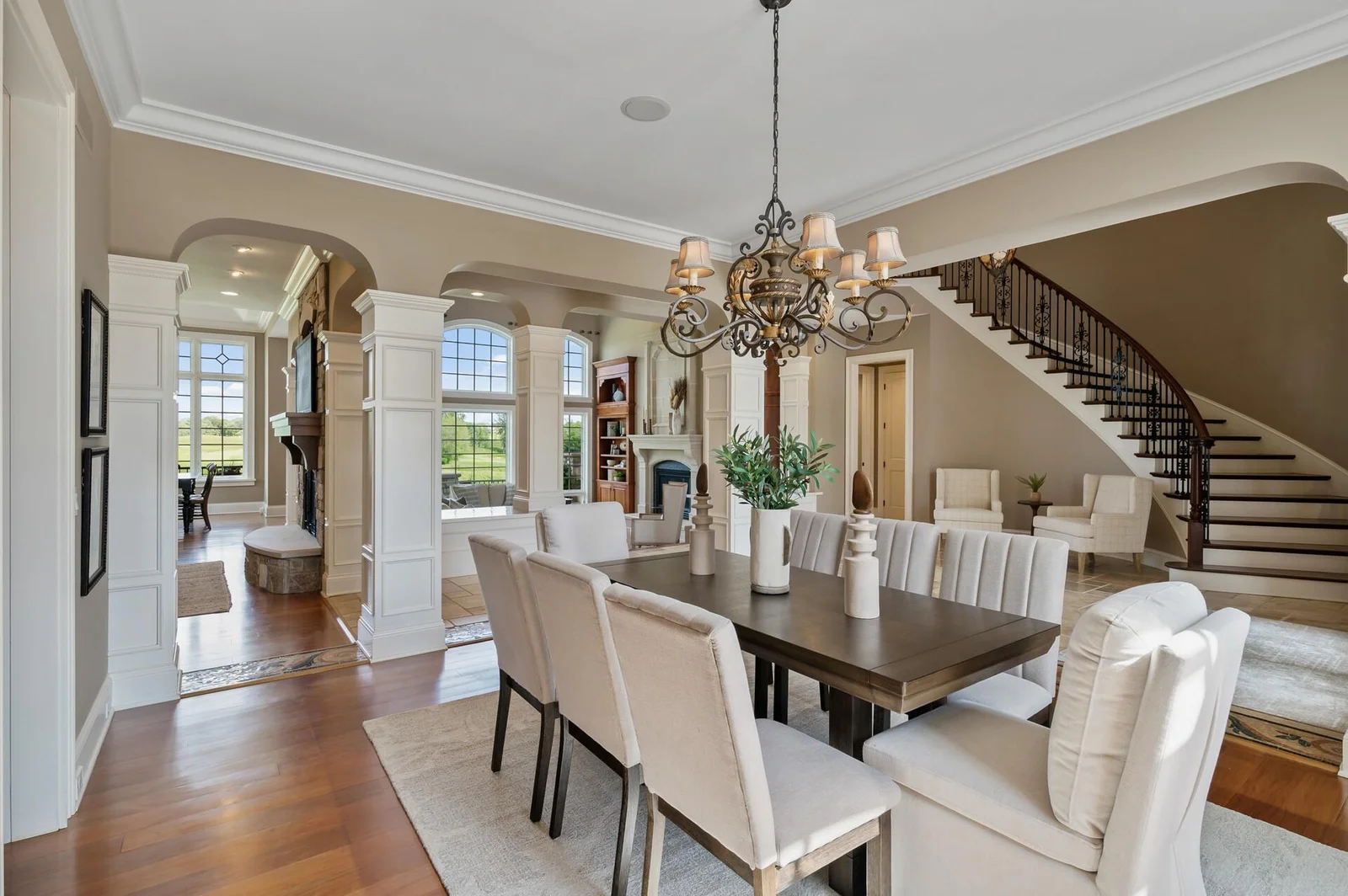 The open design allows for easy flow between the dining room and other living areas, perfect for entertaining.