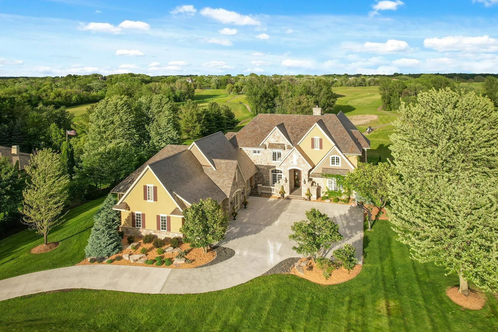 Nestled amongst lush greenery, this magnificent home offers a private retreat.