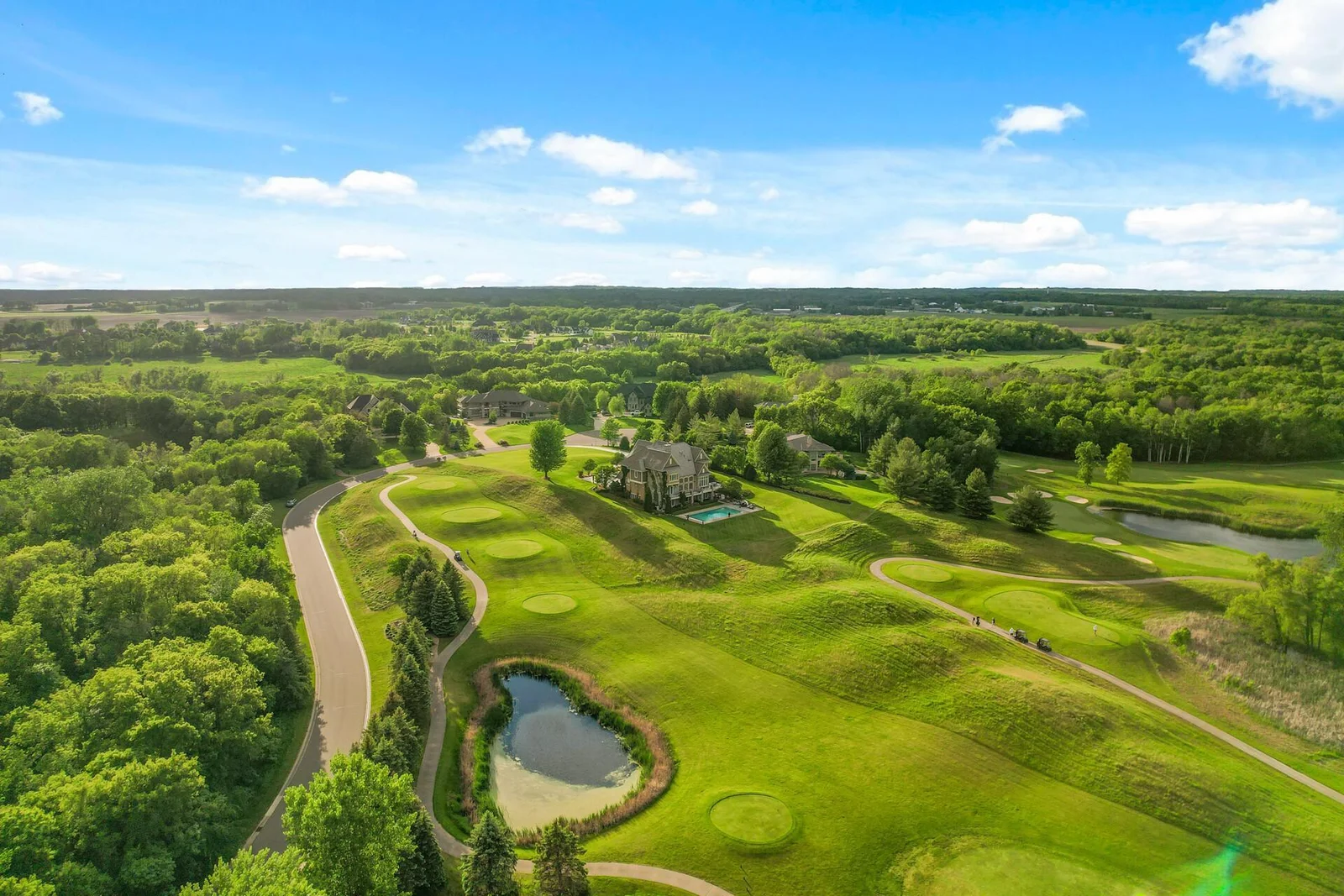 Experience the epitome of luxurious living in this exceptional home offering both privacy and direct access to the golf course.