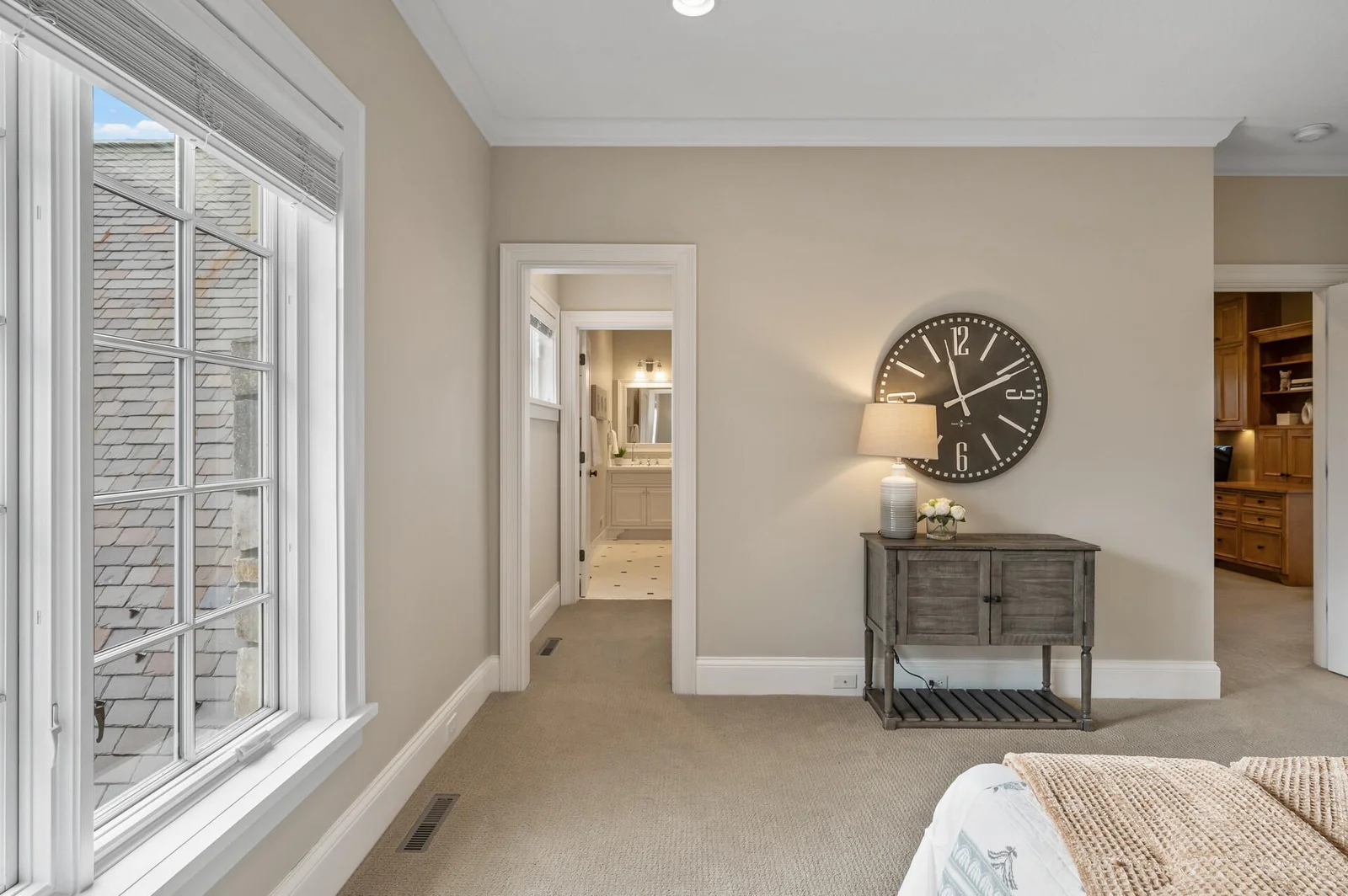 Thoughtfully laid out, this upper level bedroom offers a seamless transition to its own private ensuite bathroom.