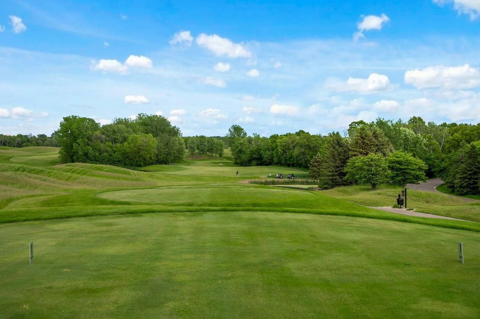 The lush greens of the golf course provide a picturesque and serene backdrop for this exceptional home.