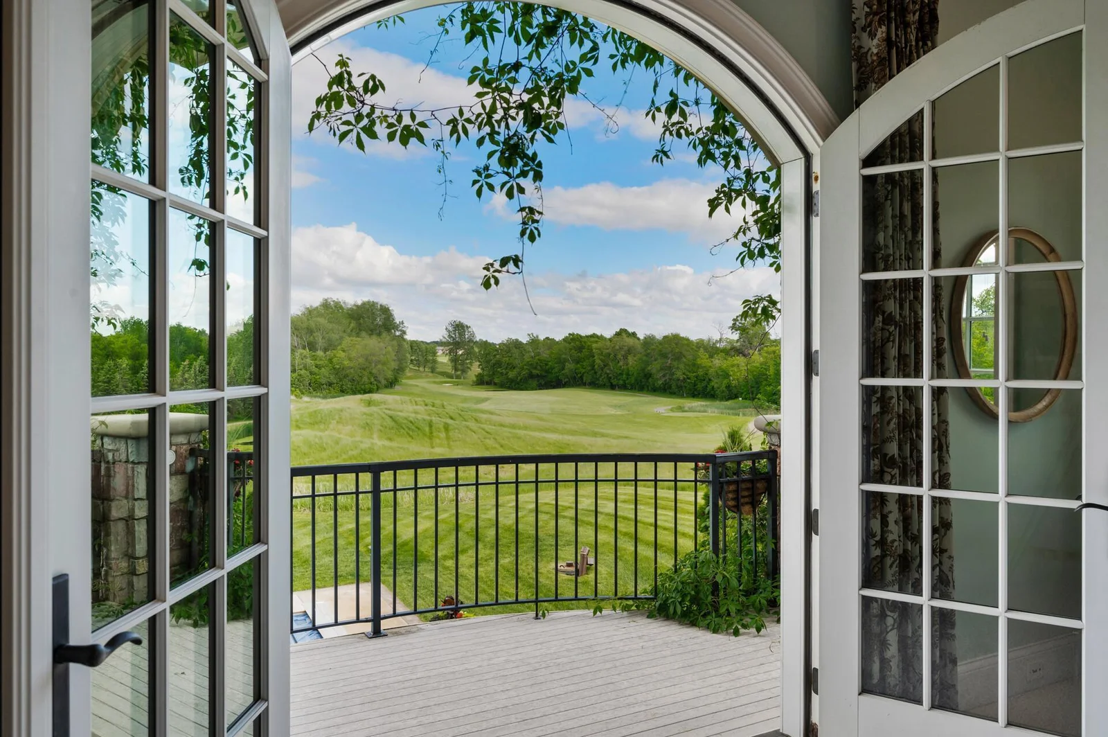 Step out onto the balcony and immerse yourself in the serene setting, directly accessible from the primary suite.
