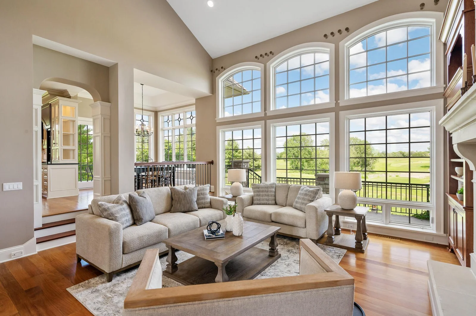 Immerse yourself in the beauty of the surrounding landscape from the comfort of this elegant living room.