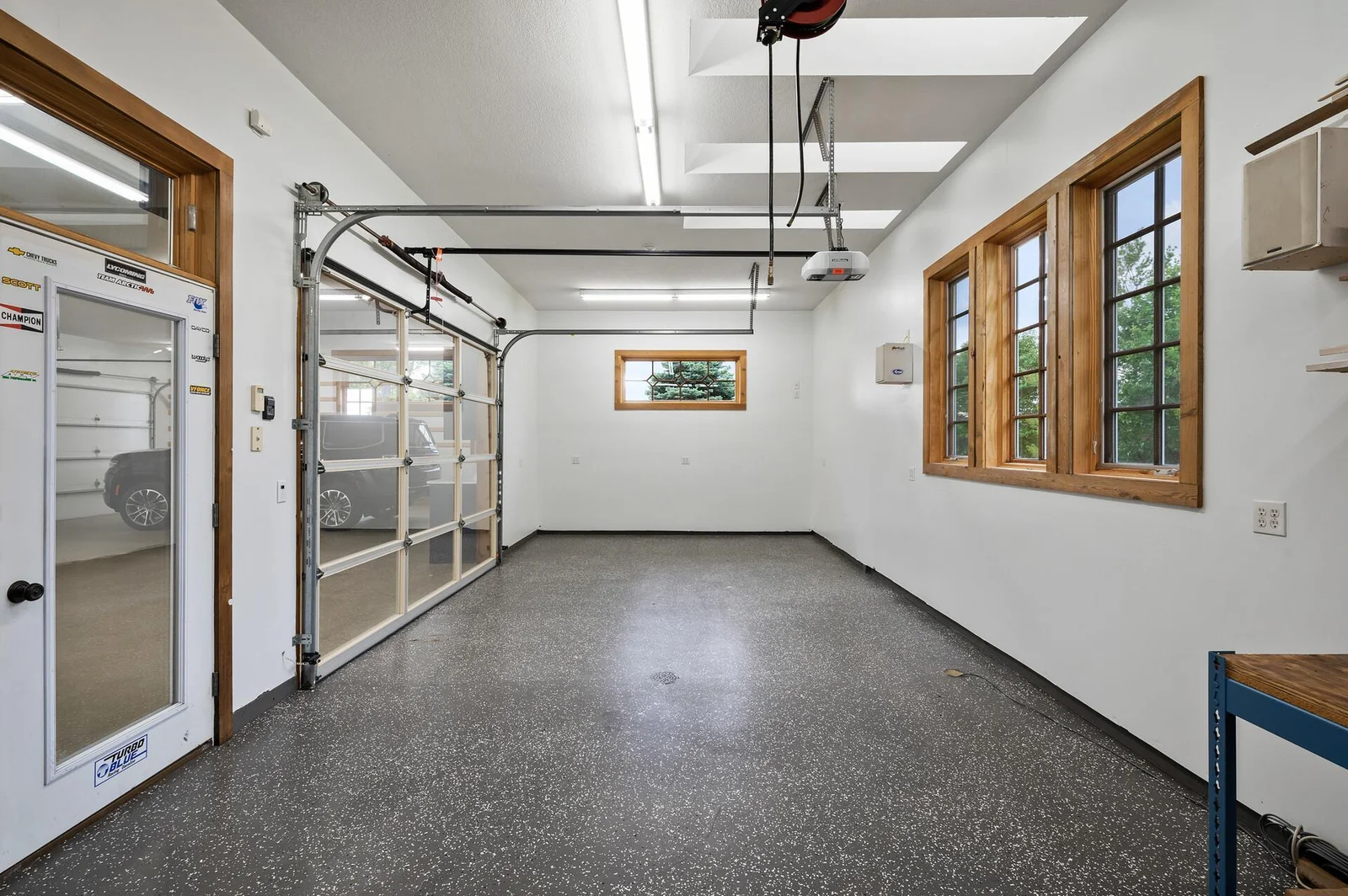 Imagine a comfortable kids' play area or a dedicated hobby space in this heated room, conveniently located off the 6-car garage.