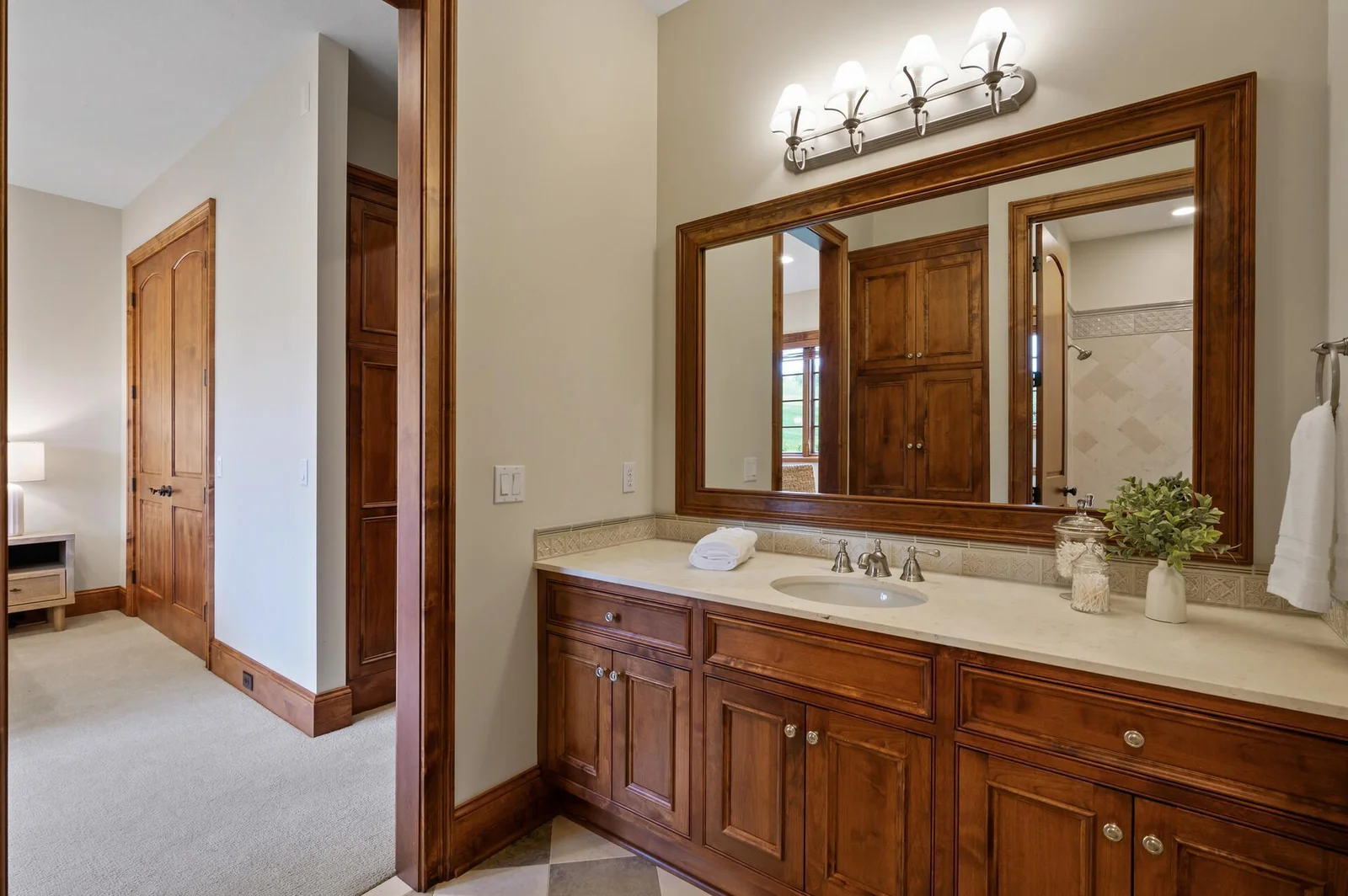 Private ensuite bathroom connected to this lower level bedroom.