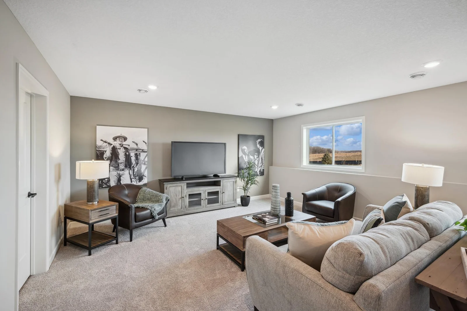 Family Room (2). Photo is of former model home. See Sales Consultant for Specific Colors and Options. Ability to choose!