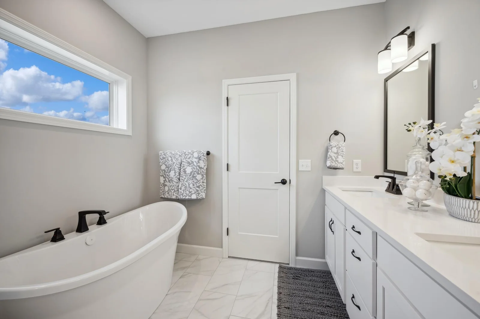 Primary Bathroom. Photo is of former model home. See Sales Consultant for Specific Colors and Options. Ability to choose!