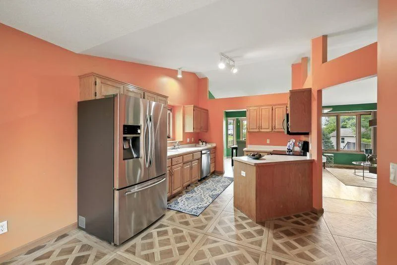 Main level kitchen with eat in dining area + separate formal dining room