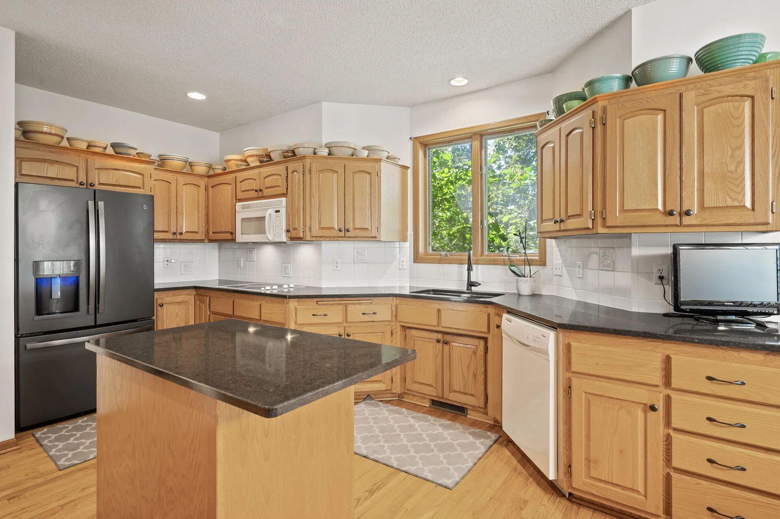 Natural wood work and kitchen island