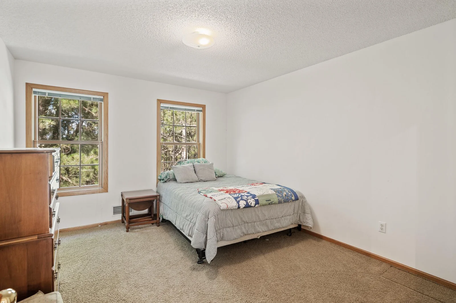One of the three upstairs bedrooms