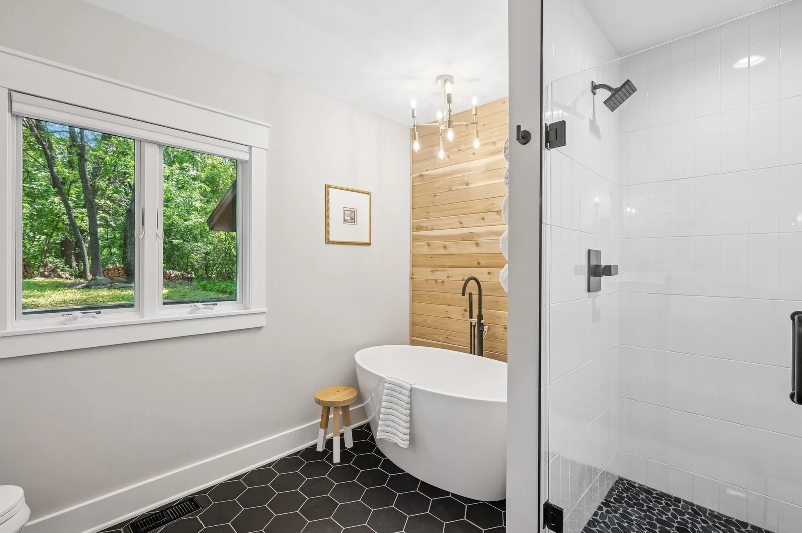 Heated floors and fully tiled shower with glass doors makes this a spa like experience inside your home!