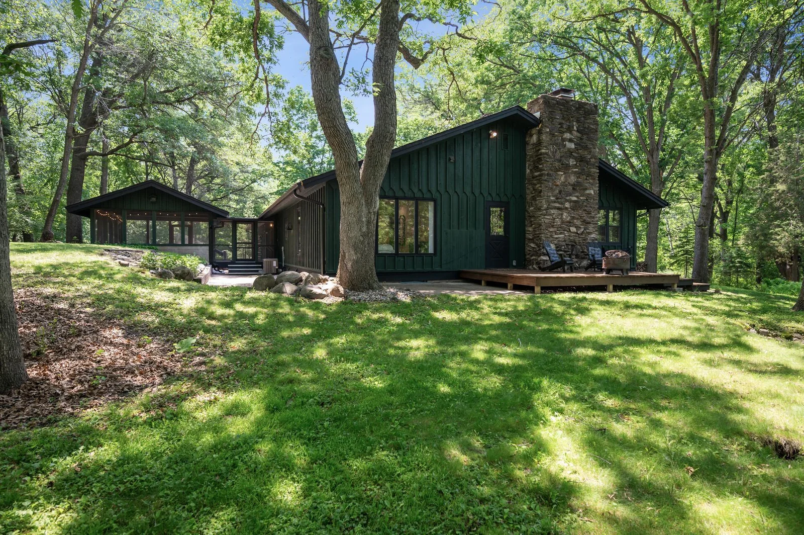 Beautiful home with luxury cottage feel has multiple outdoor spaces to enjoy, relax and entertain.  Add a dock to your private pond for even more outdoor options!