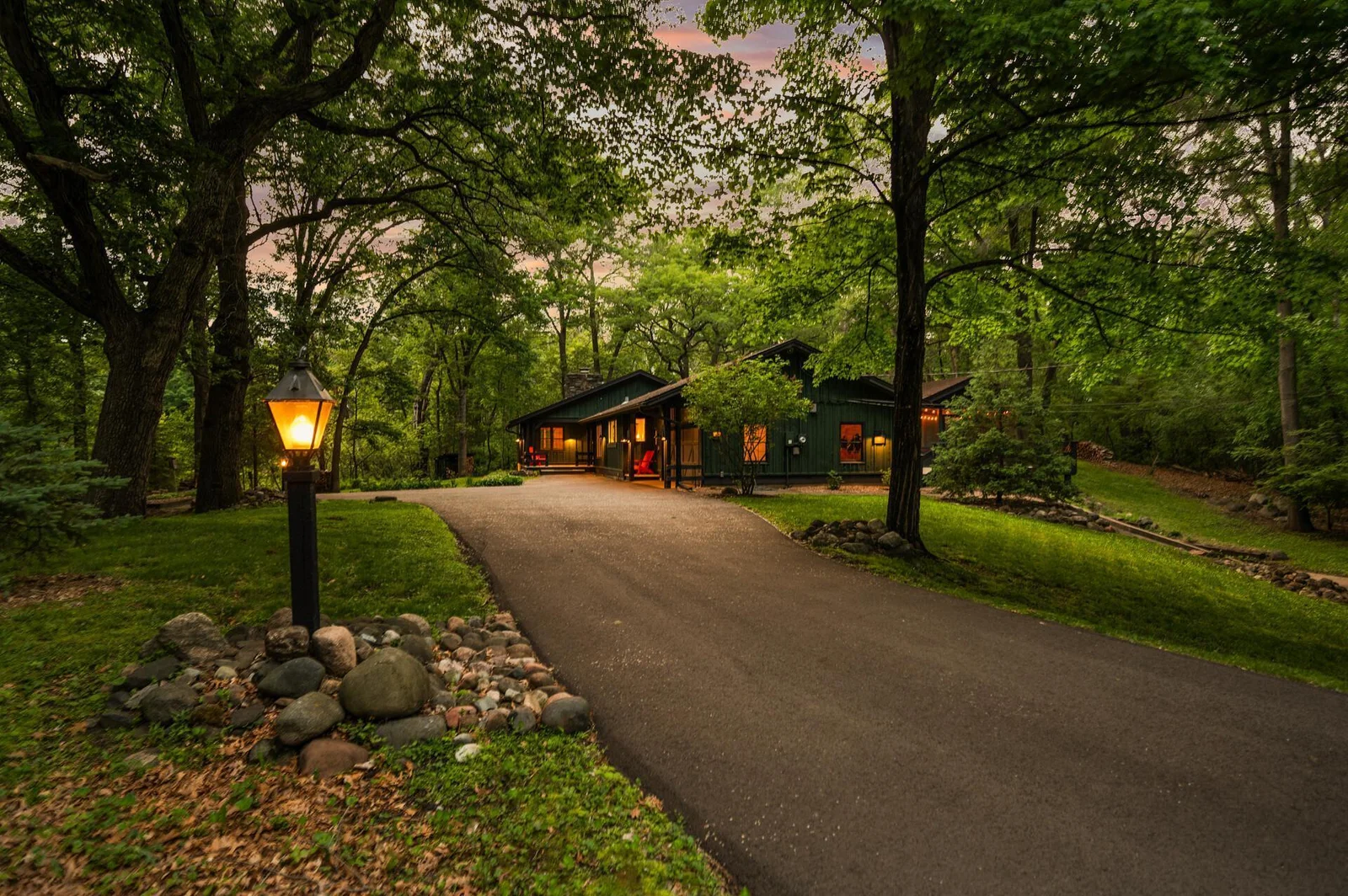 Nestled on a 3+ acre wooded property, the long winding private driveway weaves you past your own pond, to your private woodland retreat.