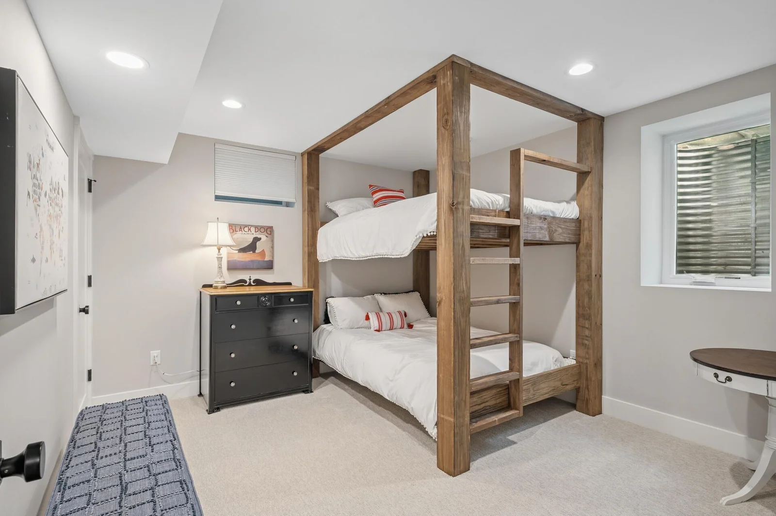1 of 2 lower level bedrooms.  This one complete with custom built in queen size beds and massive walk in closet.