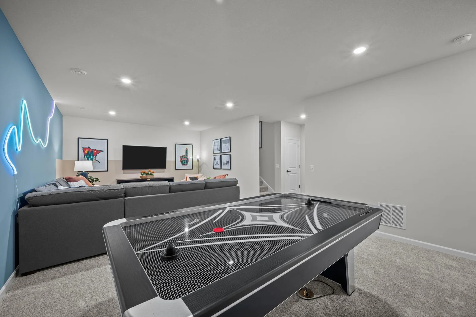 Game room, bedroom 4, bath-model home basement