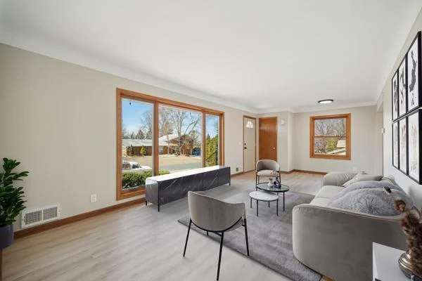 Light and bright large Living room virtually staged.