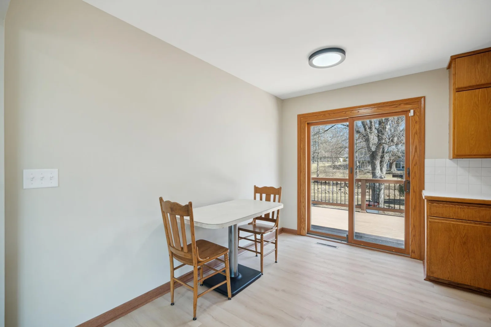 Eat in kitchen with walk out  to the composite deck overlooking the large back yard