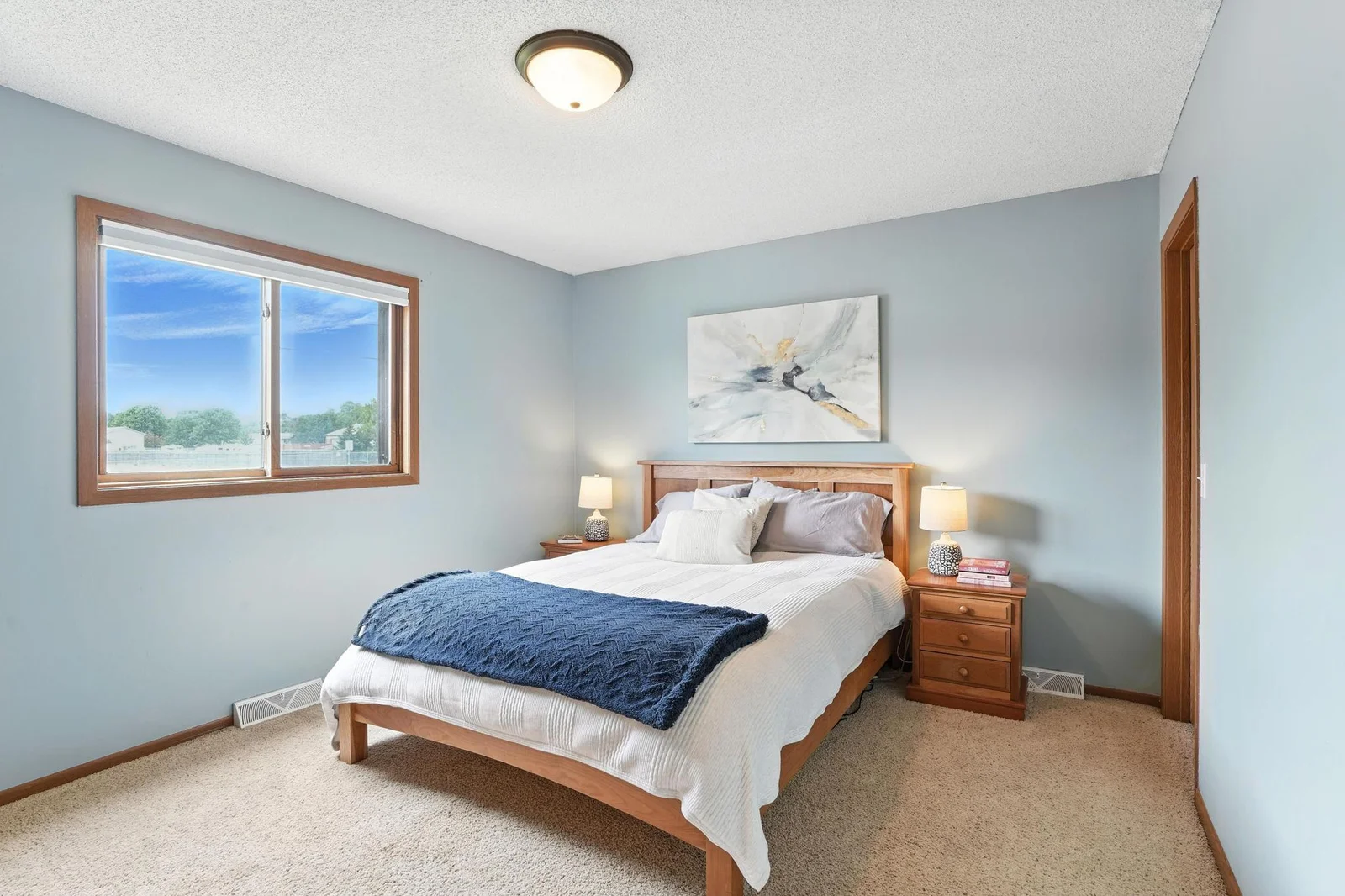 Primary bedroom with walk in closet