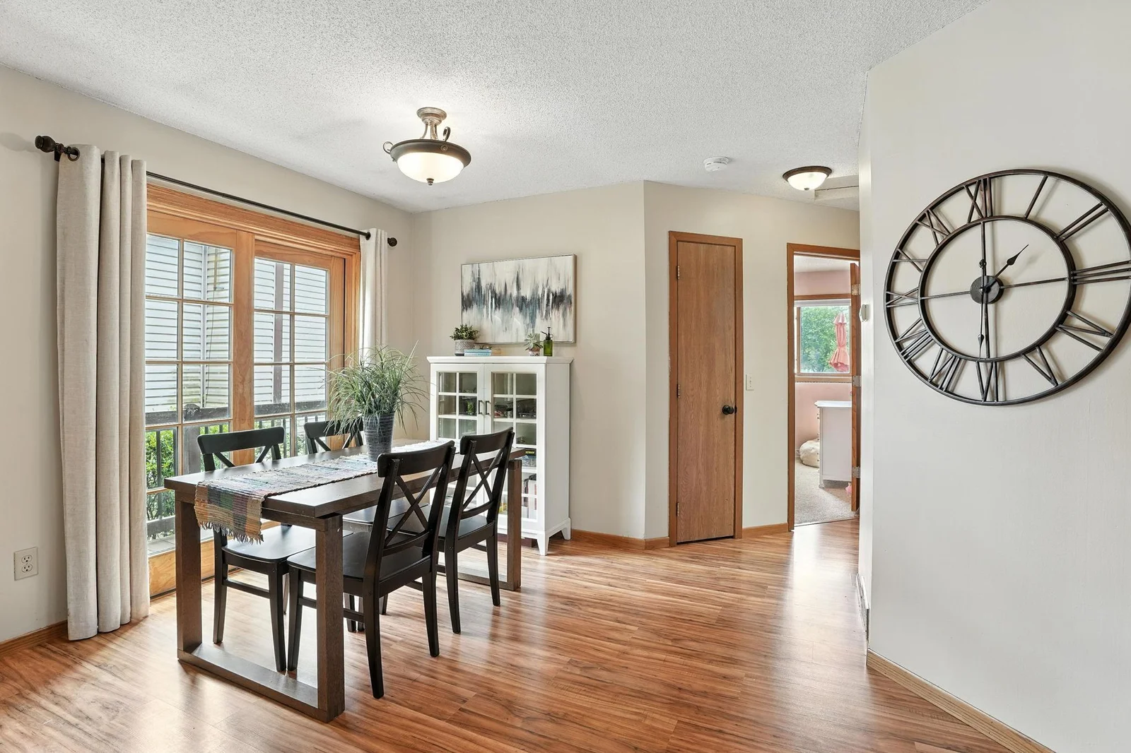 Dining area with patio door to deck for easy access to grilling!