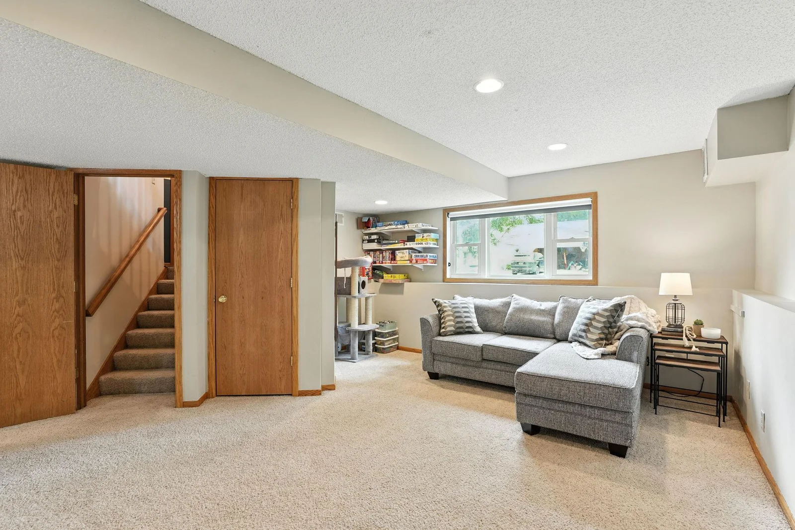 This door leads to a large storage space that extends below the whole entry way