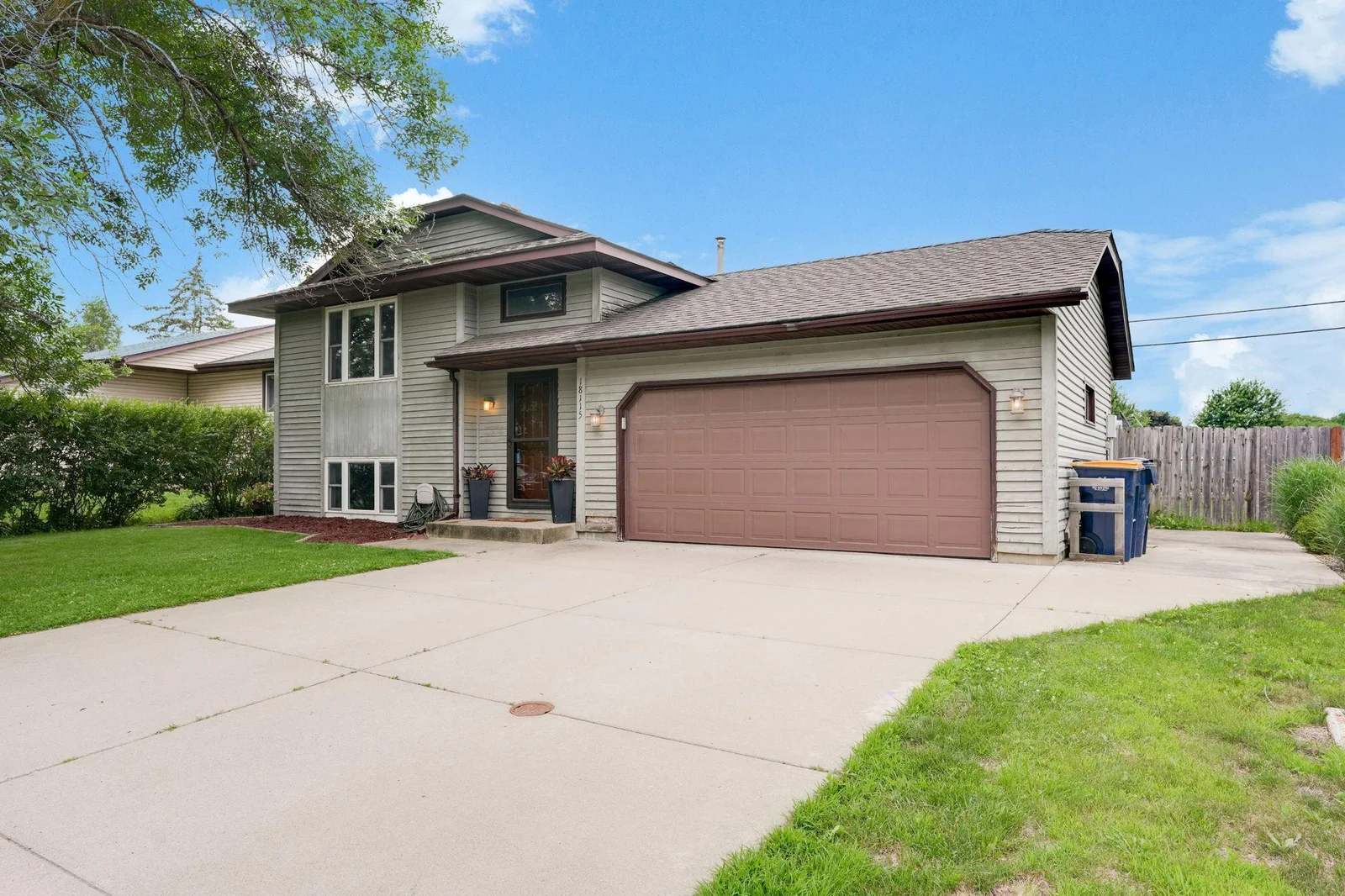 Extra driveway along garage is perfect for storing a boat or trailer as well!