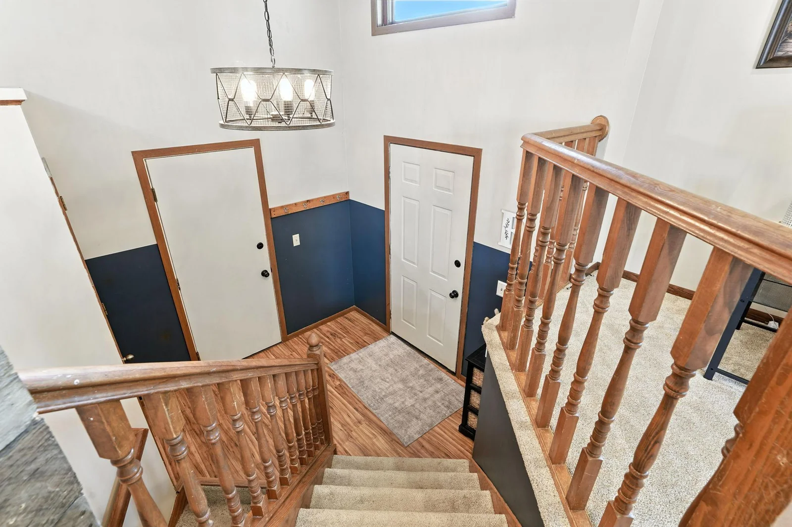 Large inviting entry way with new lighting