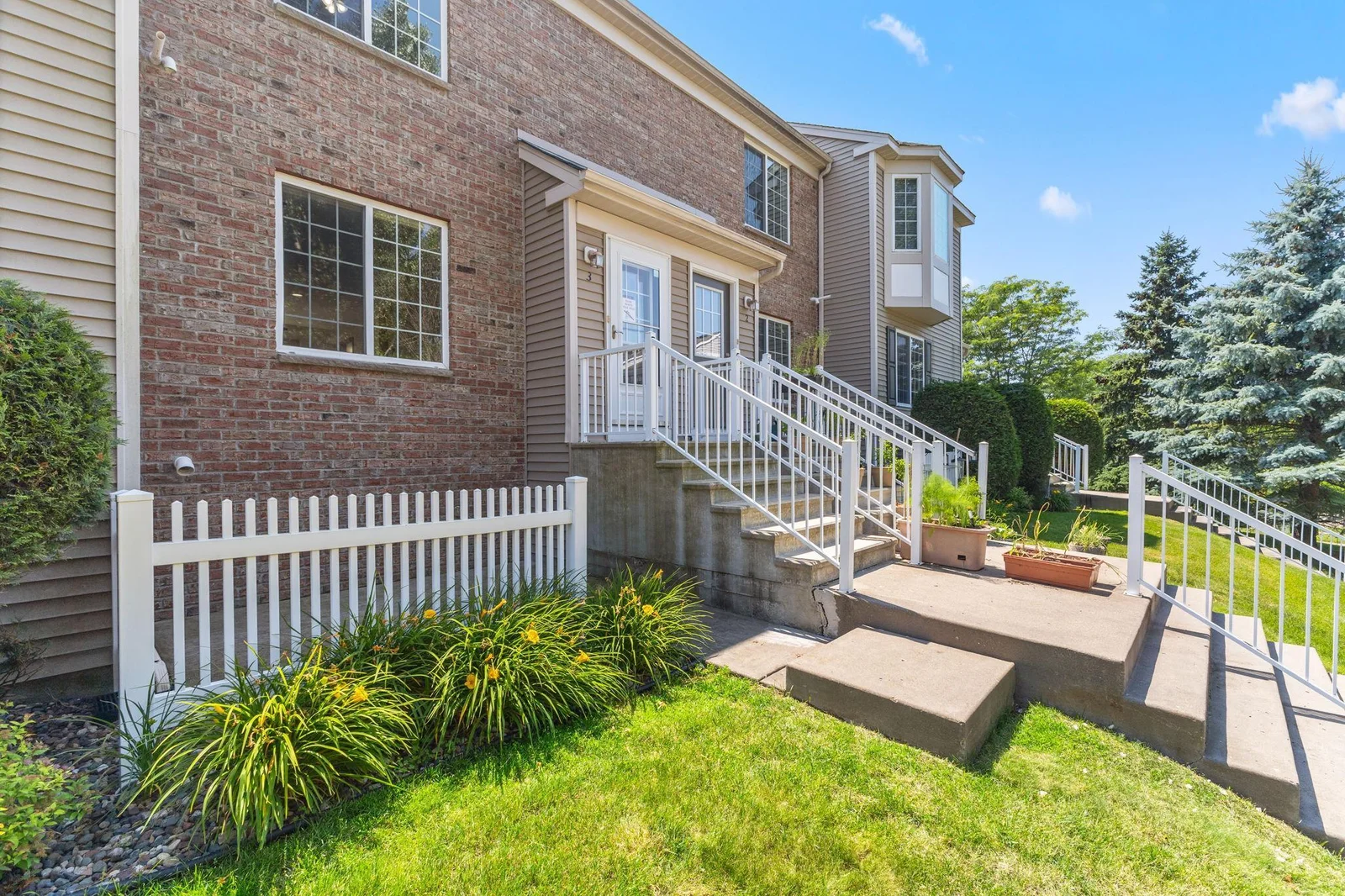 Nice Brick Exterior with Low Maintenance railings