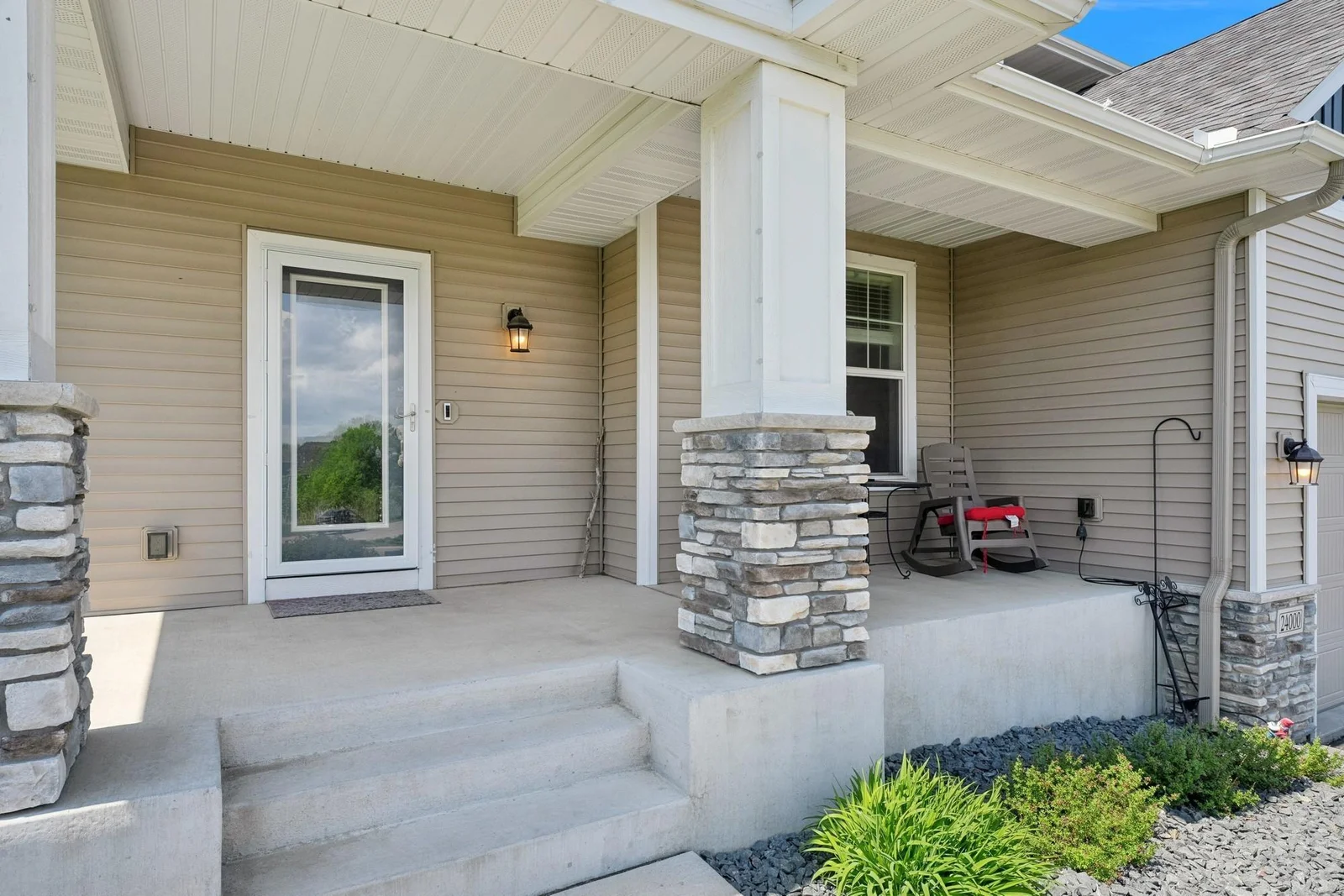 Relaxing front porch. This house has a ton of curb appeal.