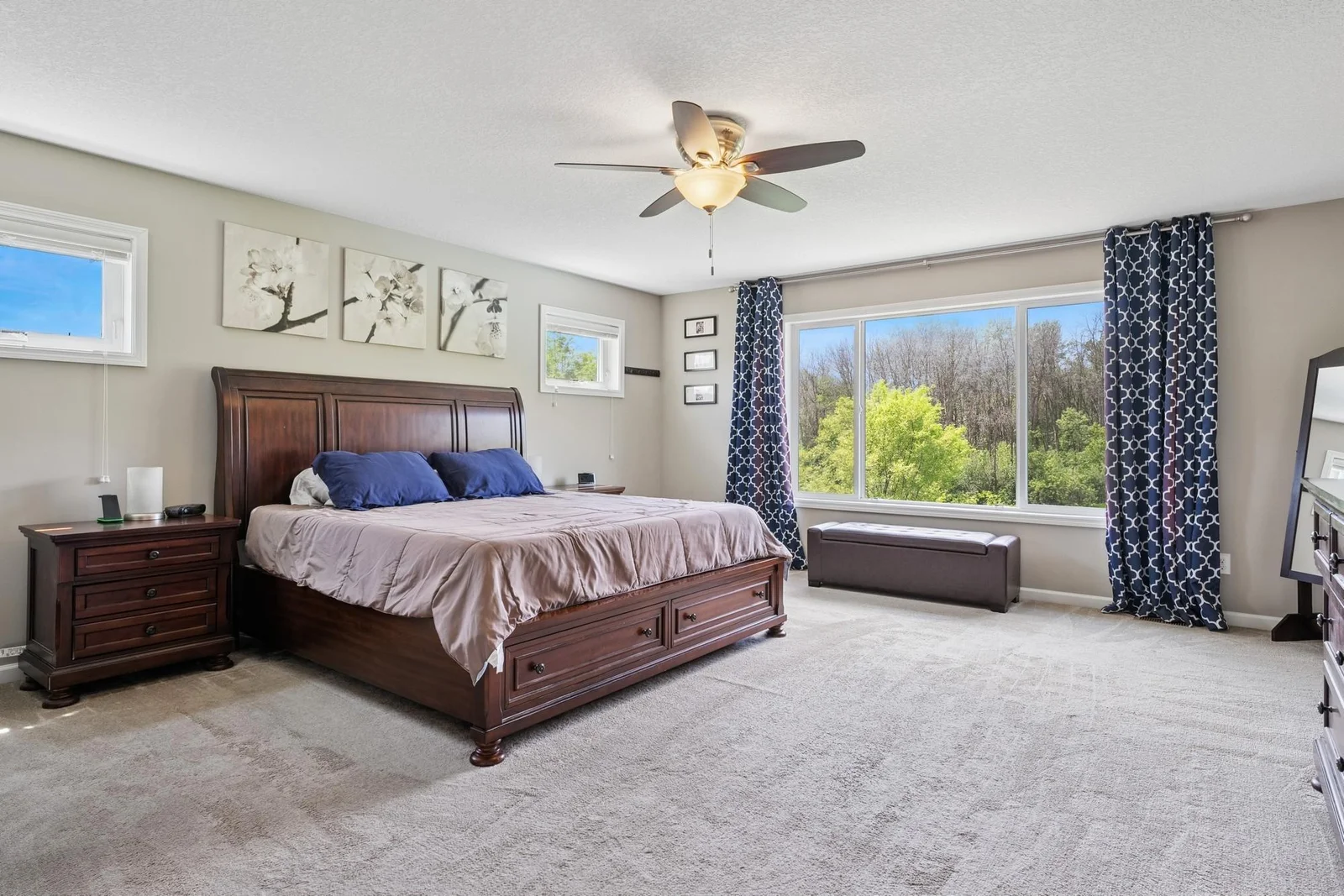 Large primary suite. Windows on two walls make it extra bright.