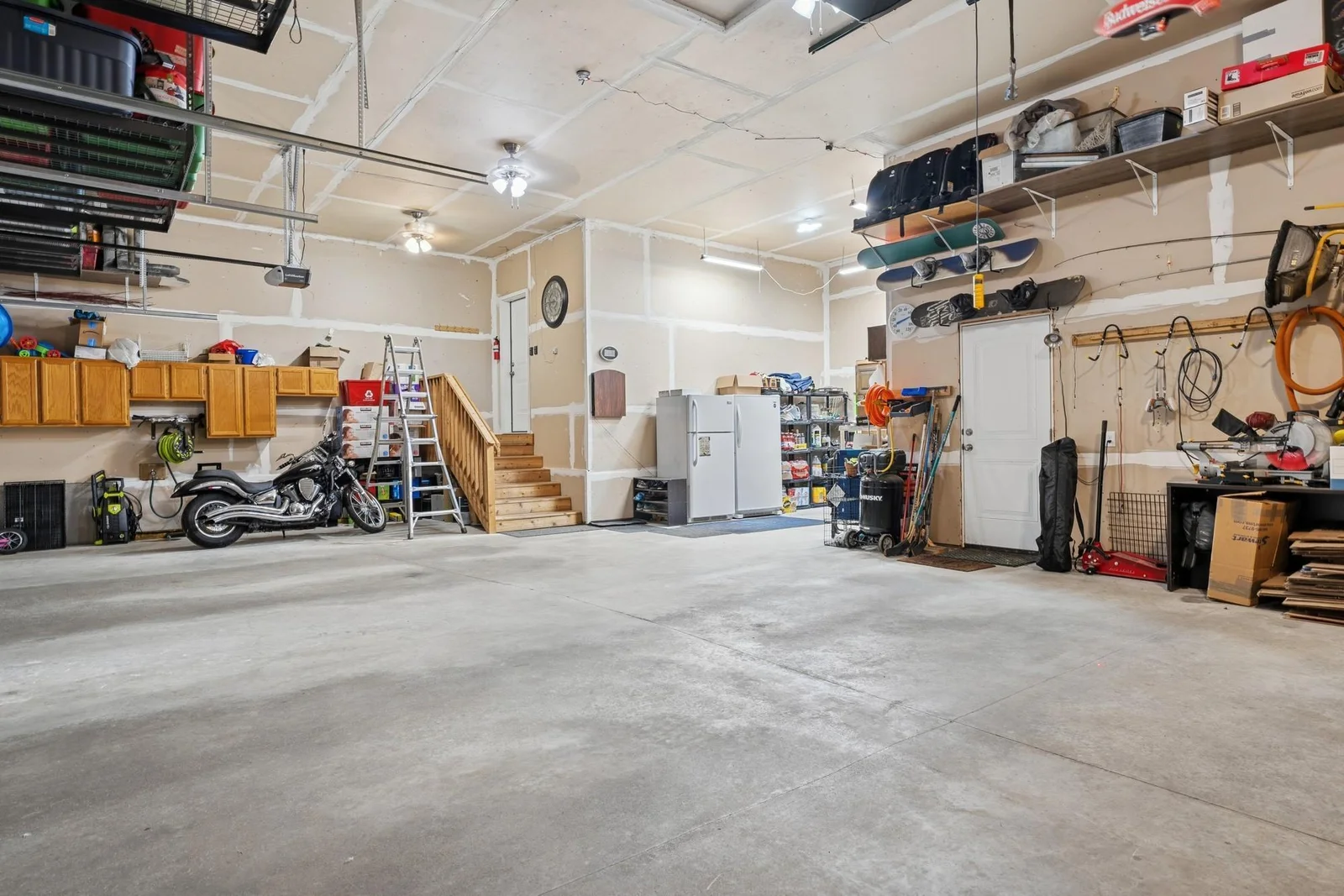 5 car tandem garage! Heated with ceiling fans