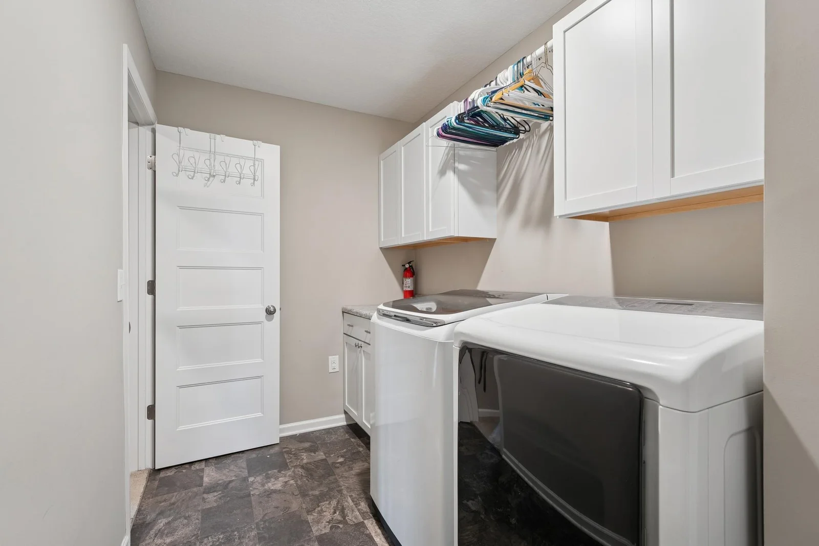 Connected to primary closet and upper level hallway