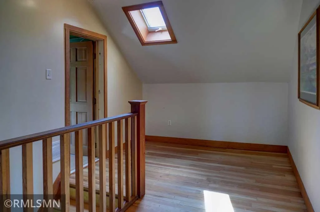 This area at the top of the stairs would make a good office or reading area.