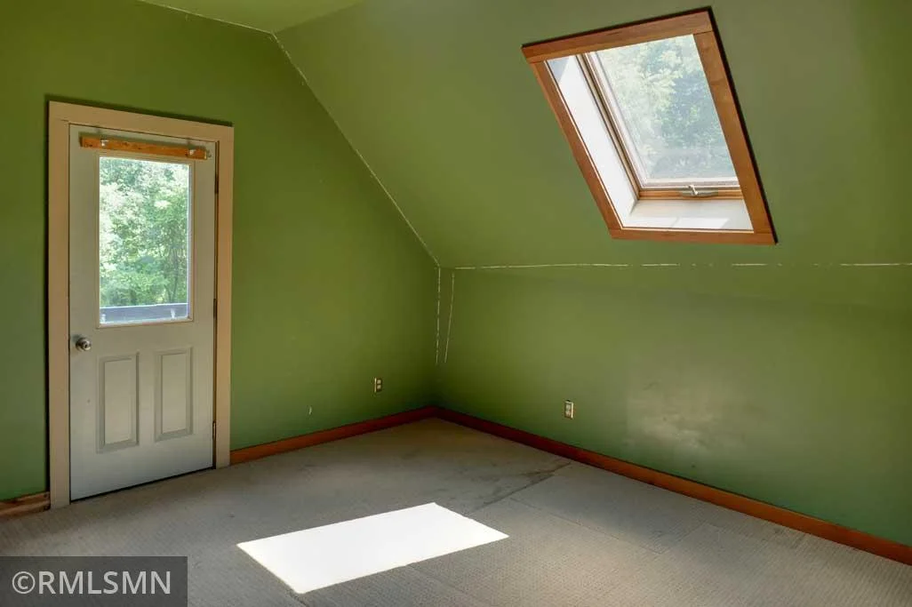 Second upper level bedroom.