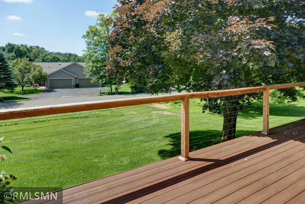Deck with composite decking and cable railing.